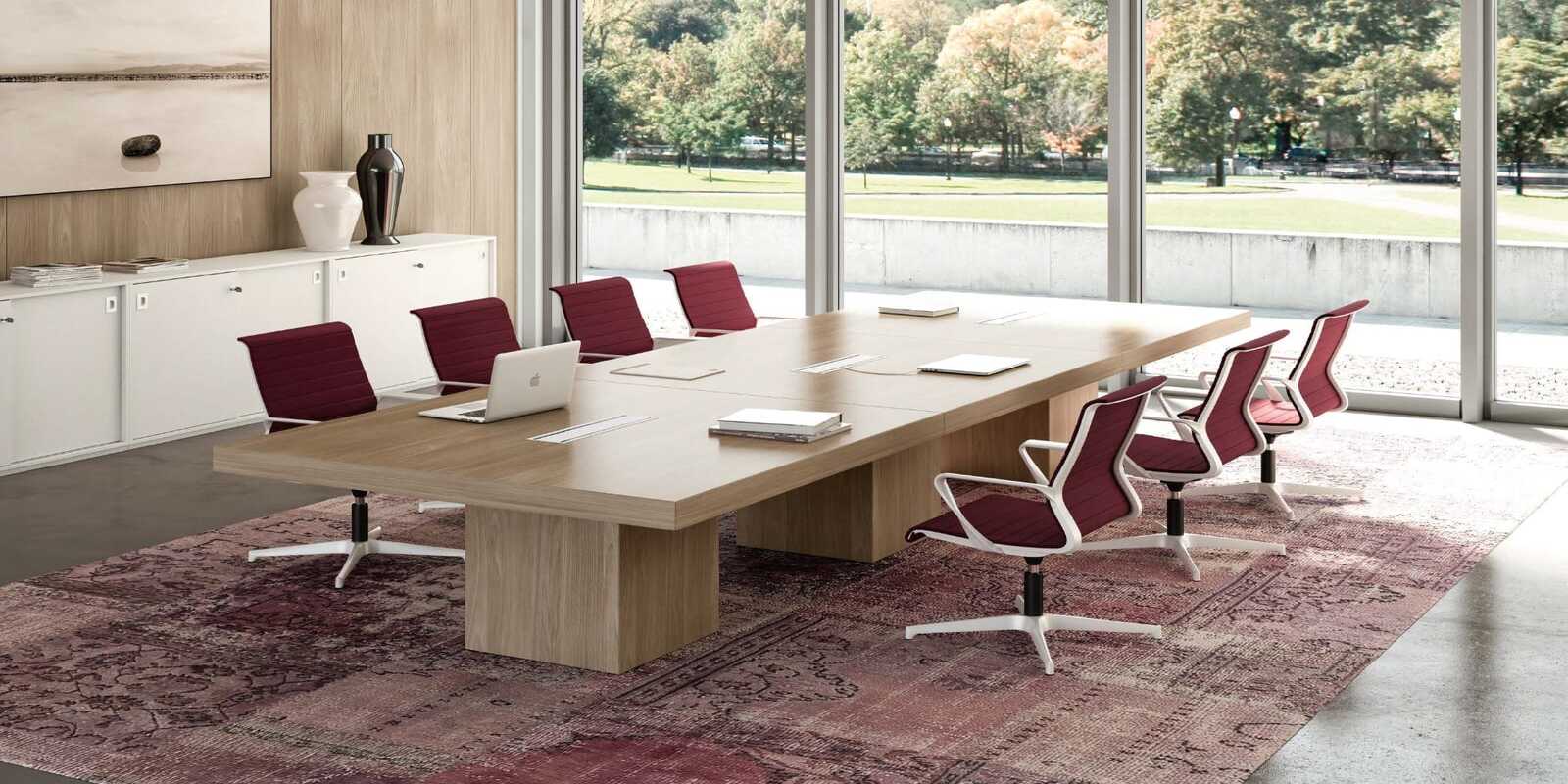 Escritorio gerencial moderno de melamina oscura con detalles cromados y librero integrado