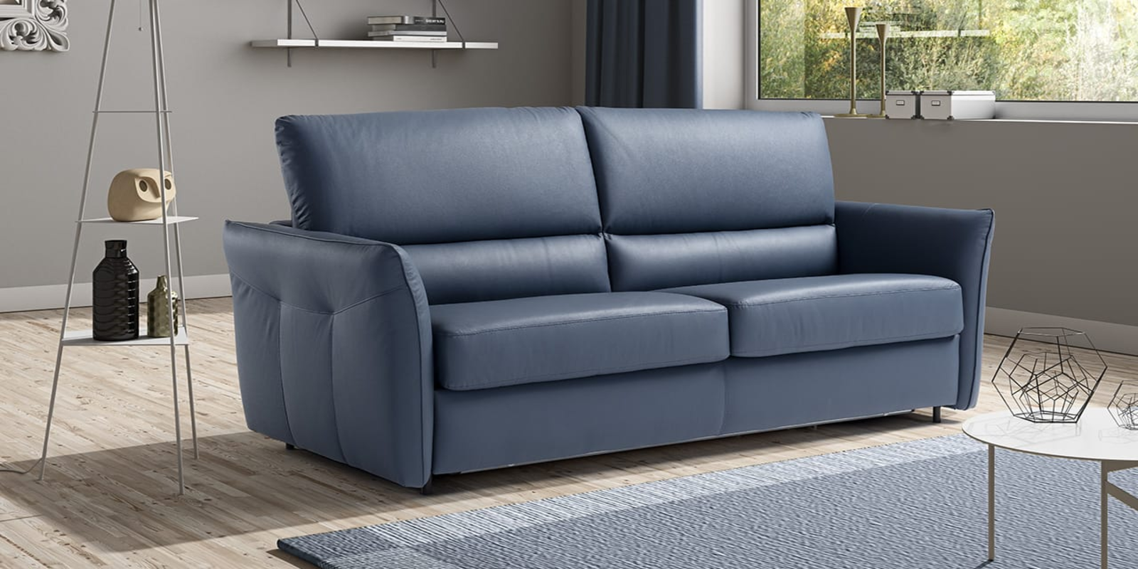 Sillón individual (butaca) tapizado en terciopelo azul con patas de madera